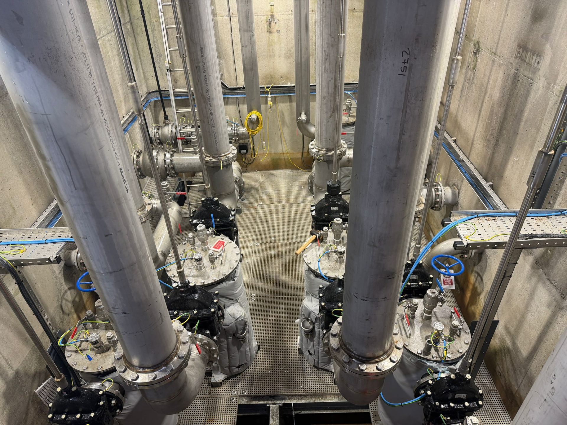 316L stainless steel risers in concrete chamber