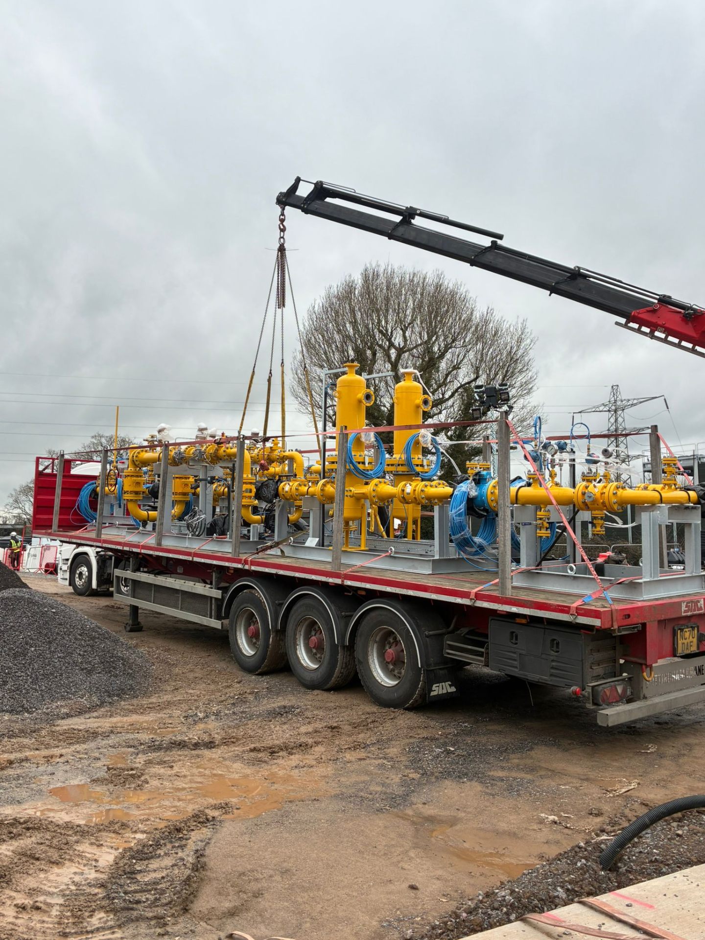 Fabricated gas skid loaded on trailer for delivery